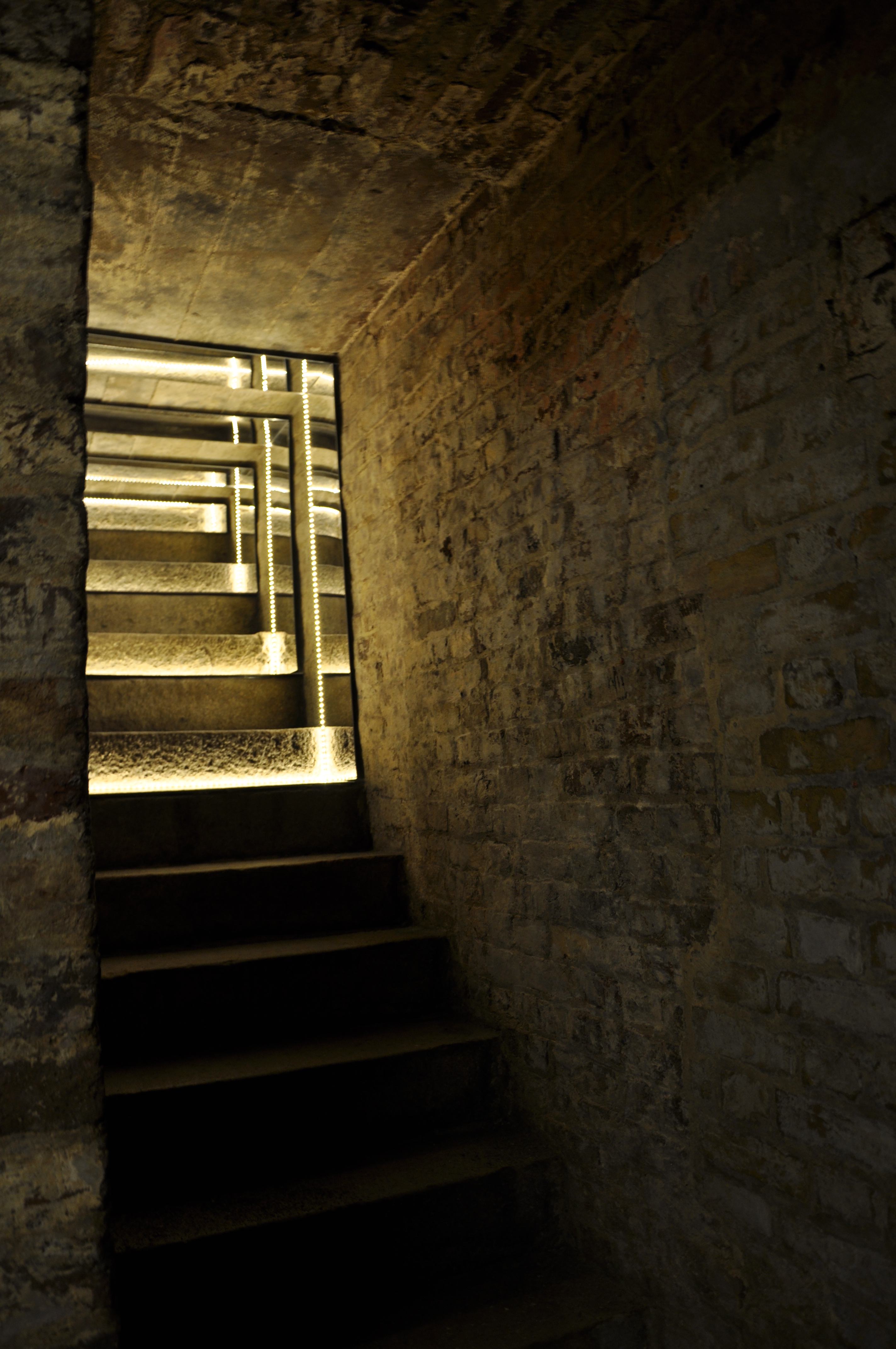 Introspection — mirror and light in the sealed stairwell