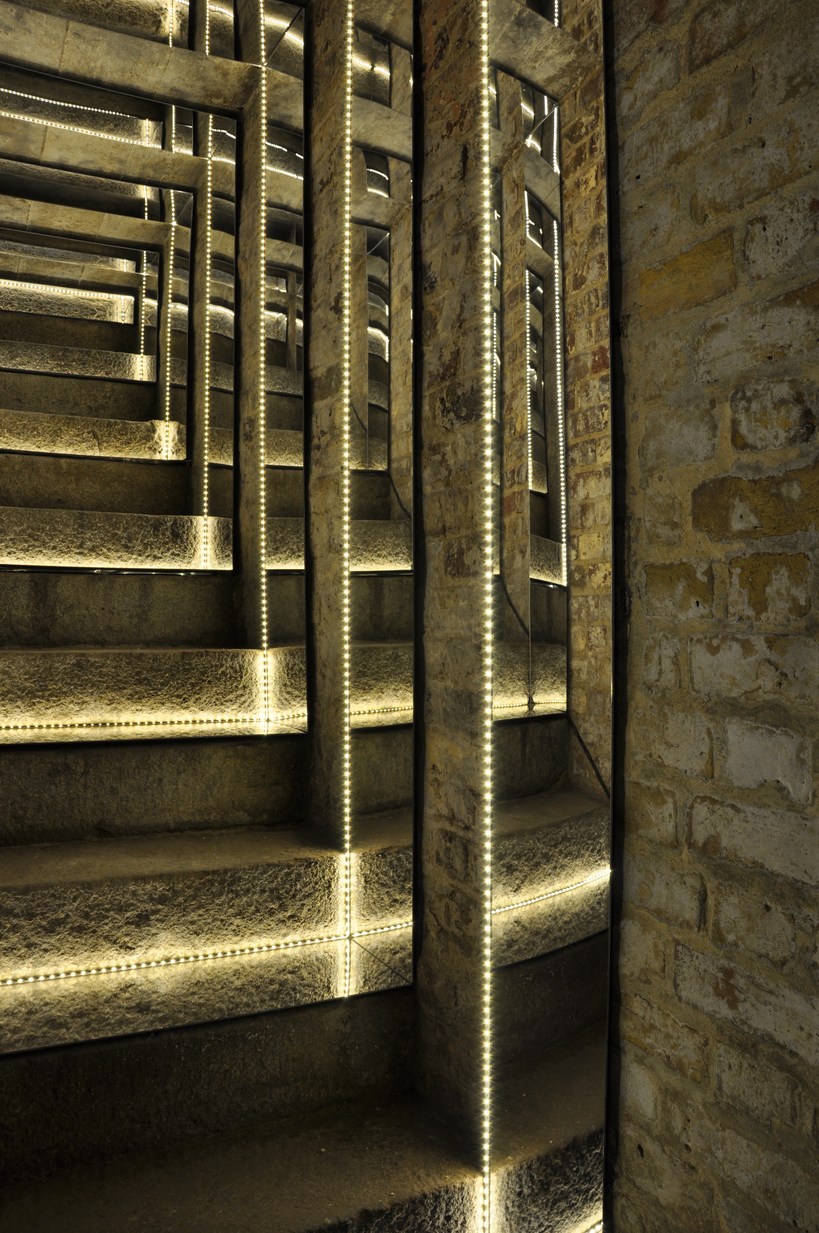 Introspection — light and stone reflected into infinity